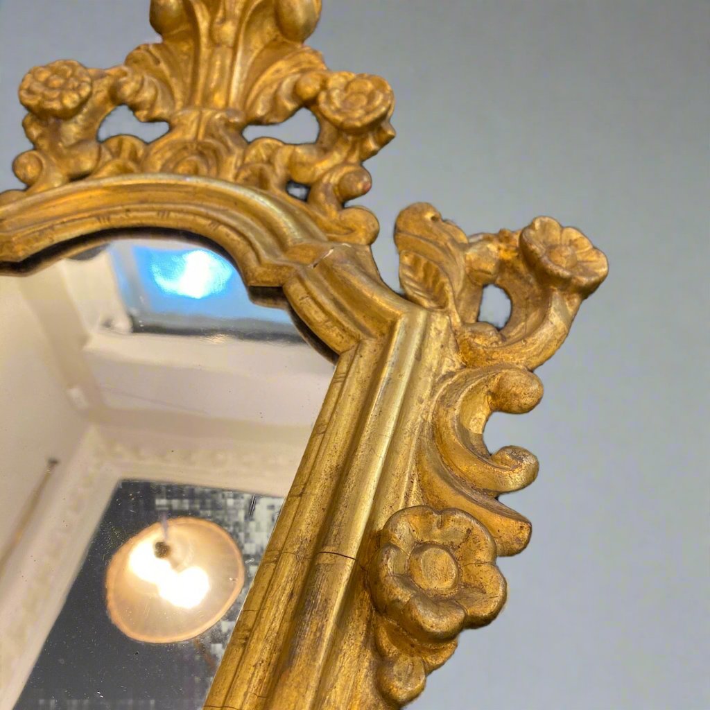 Antique pair of carved mirrors