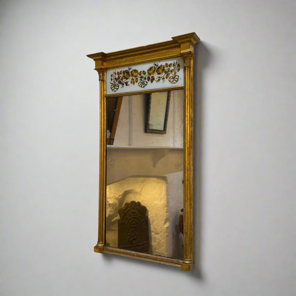 Late Regency gilt pier glass mirror with eglomise decoration circa 1825