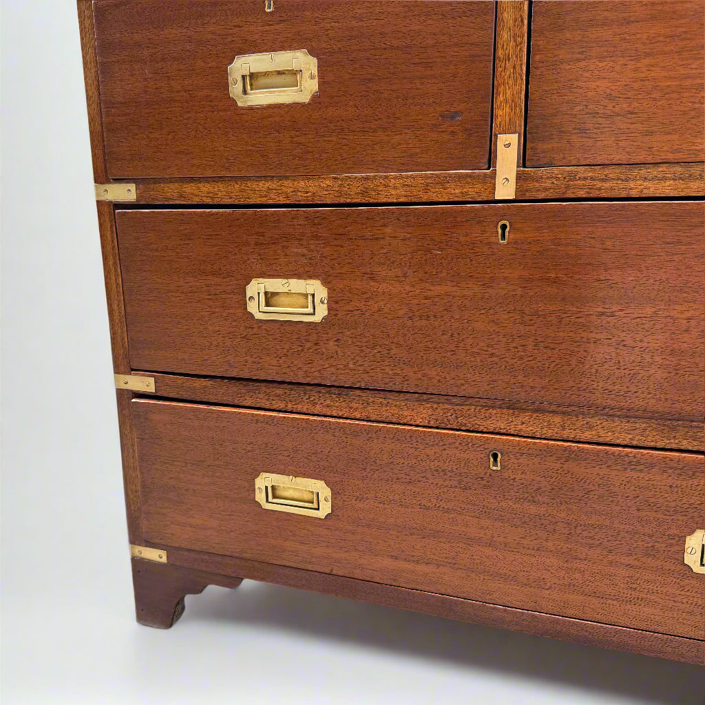 Small campaign style brass bound chest of drawers 