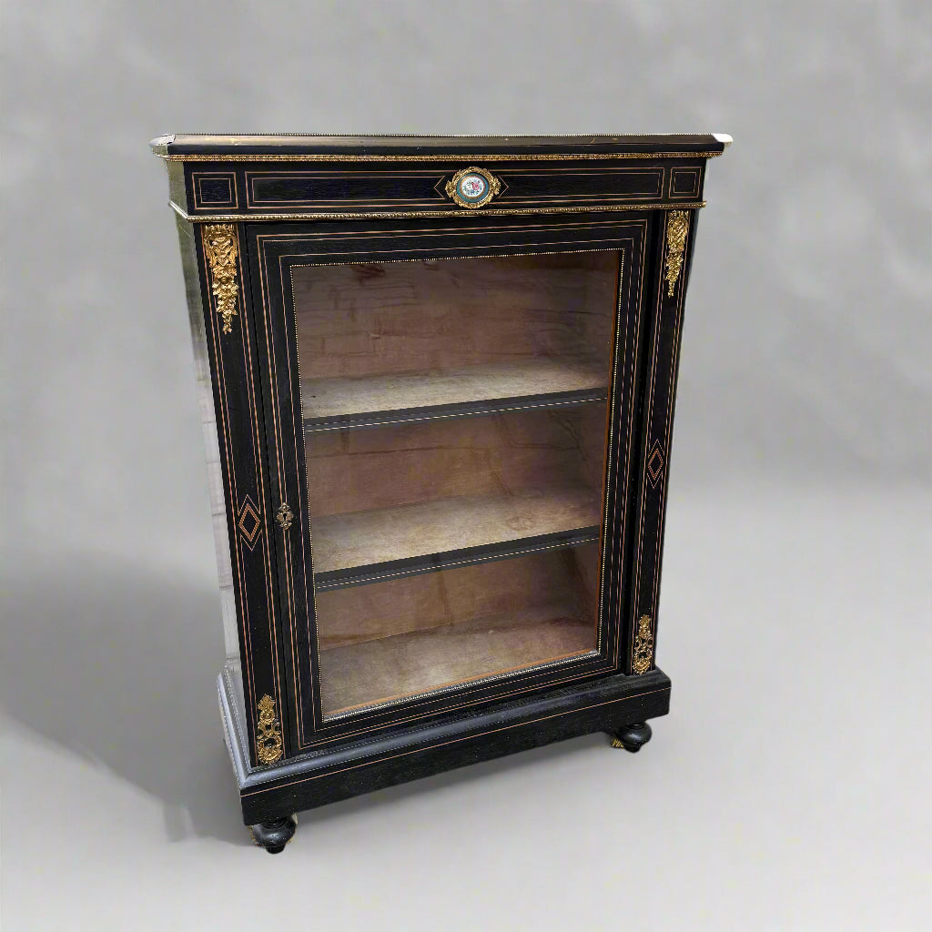 Victorian ebonised and gilt metal mounted pier cabinet with porcelain floral plaque 