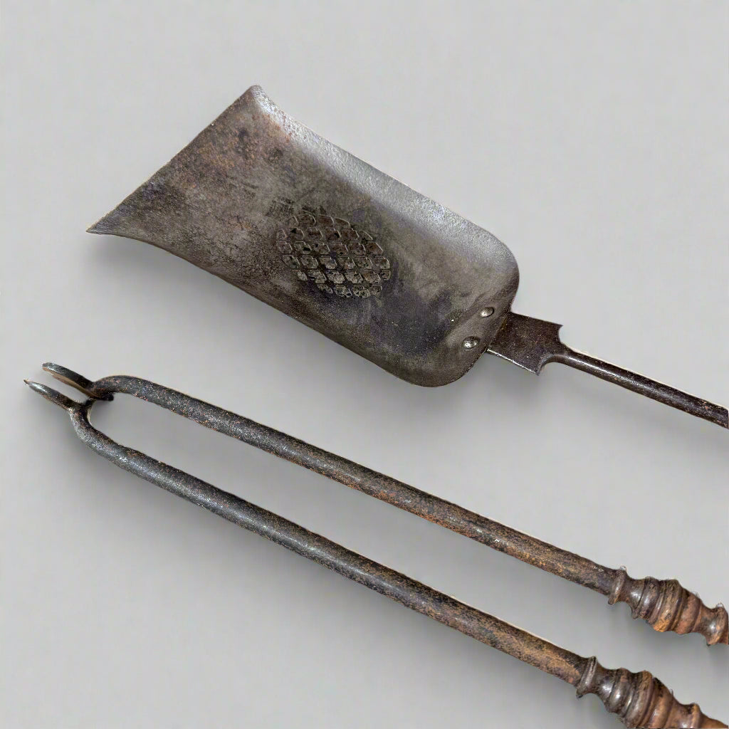 Pair of 19th century steel fire irons