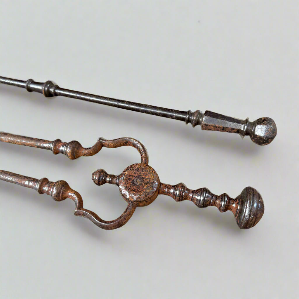Pair of 19th century steel fire irons