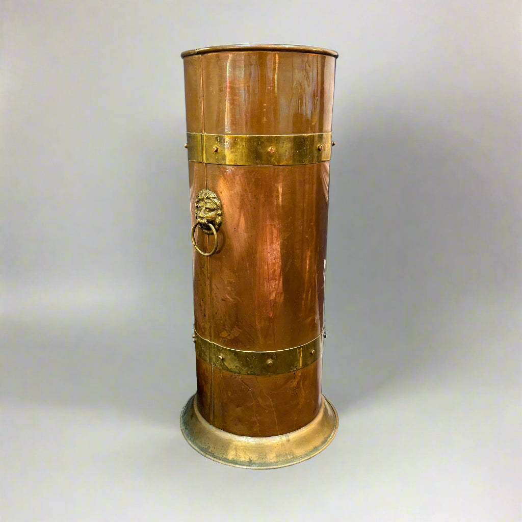 Antique copper and brass coopered stick stand with lion ring handles 