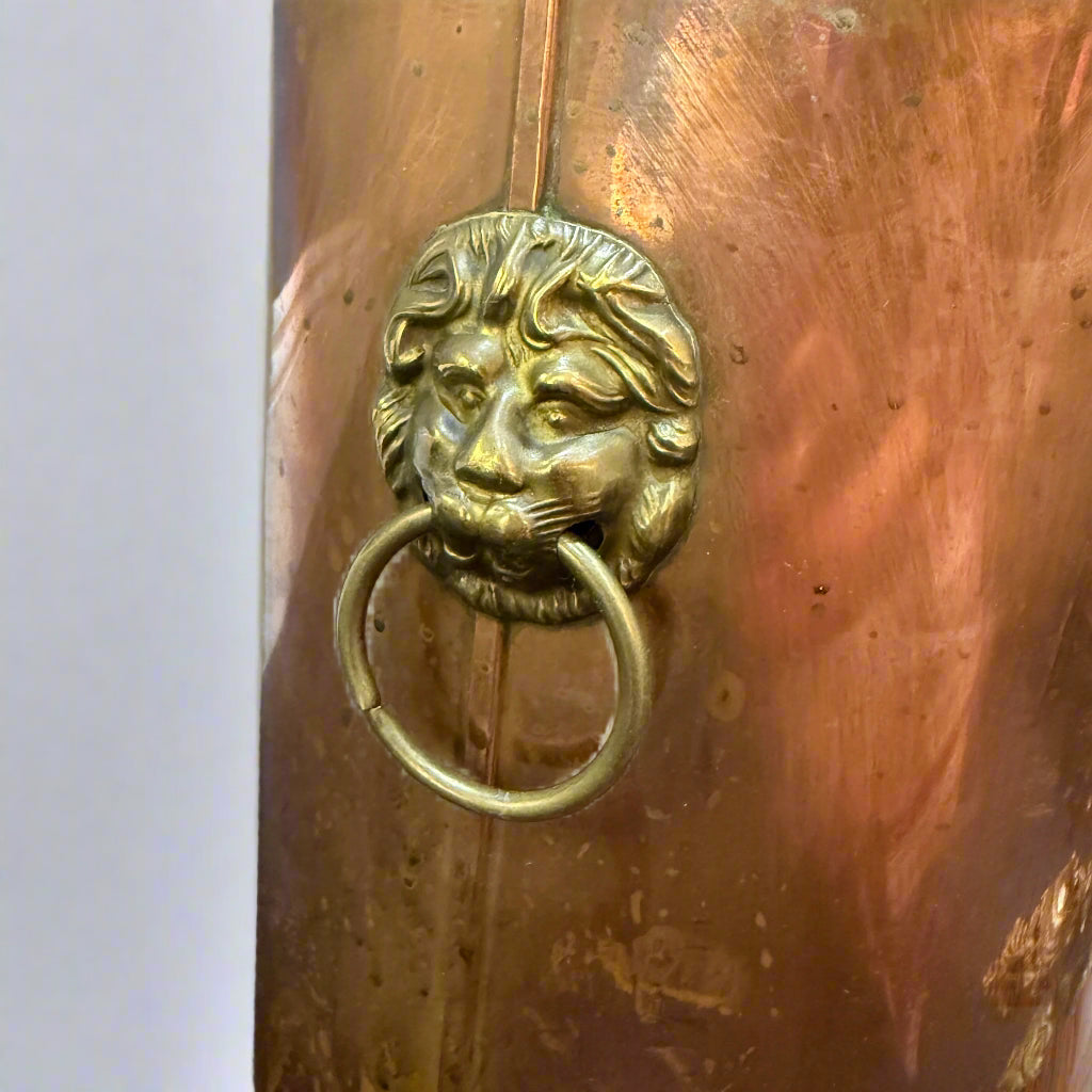 Antique copper and brass coopered stick stand with lion ring handles 