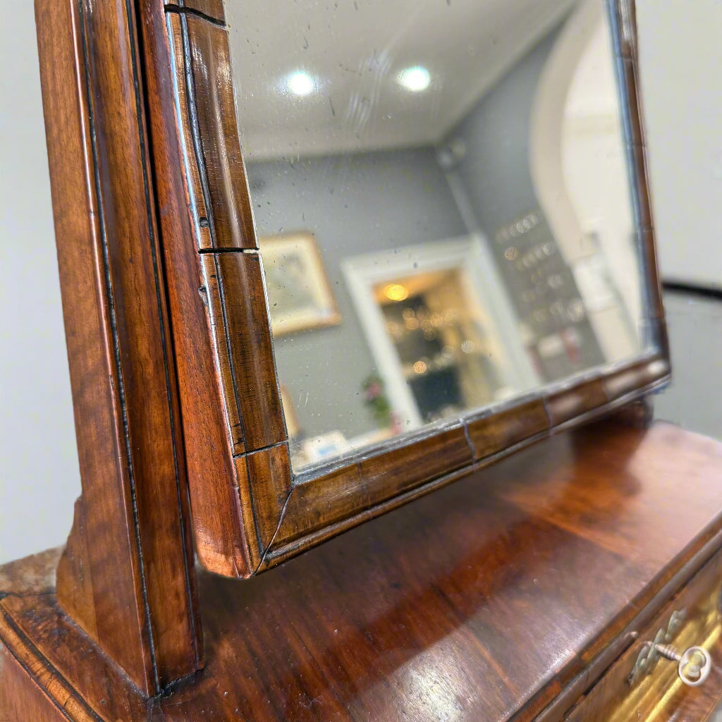 18th century walnut adjustable box mirror with three cavetto moulded drawers 