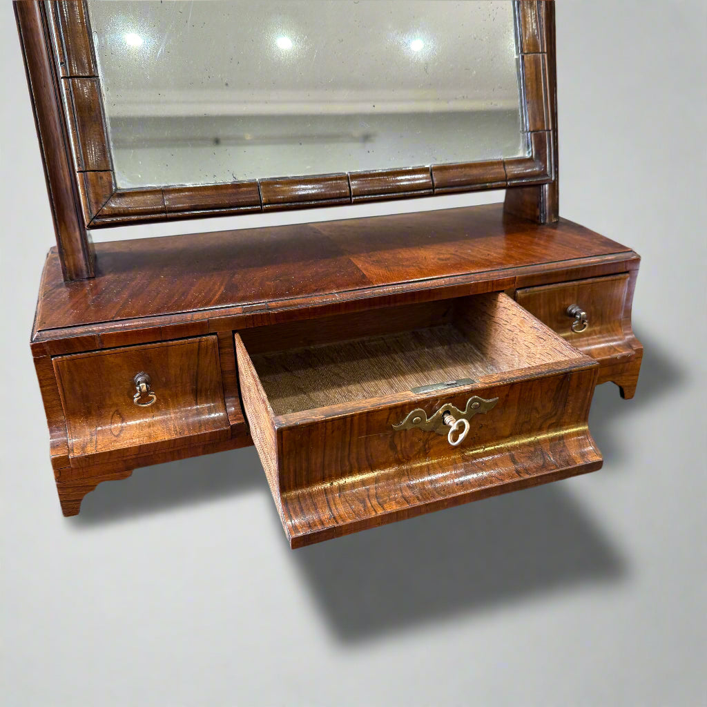 18th century walnut adjustable box mirror with three cavetto moulded drawers 