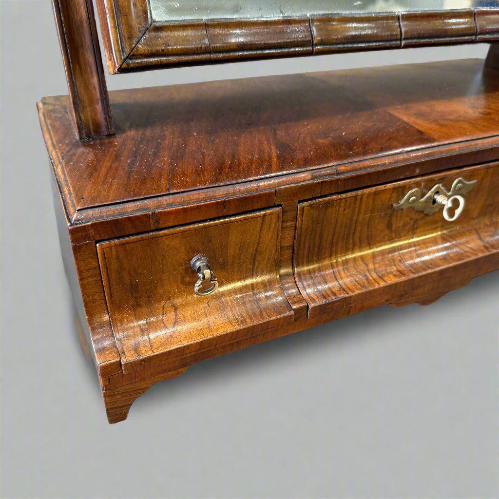 18th century walnut adjustable box mirror with three cavetto moulded drawers 
