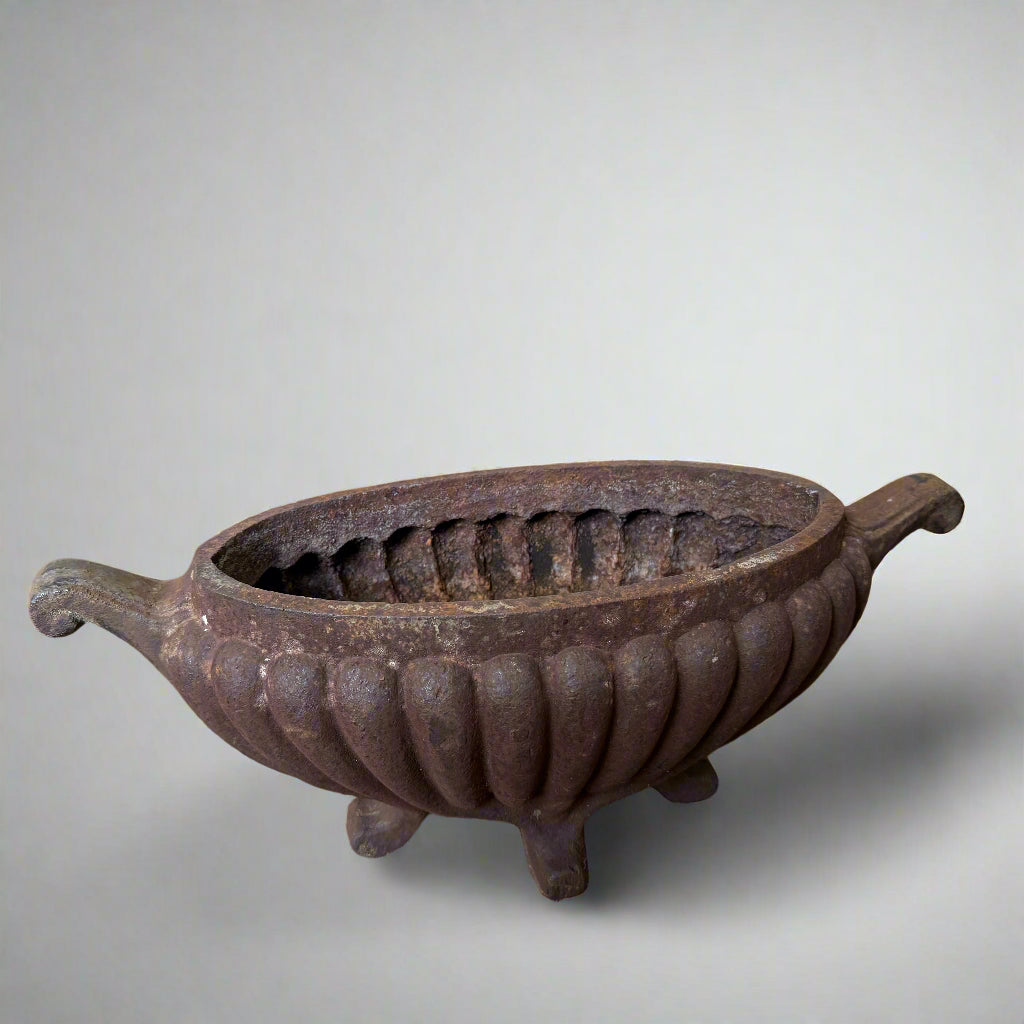 Pair of heavy Victorian fluted cast iron urns