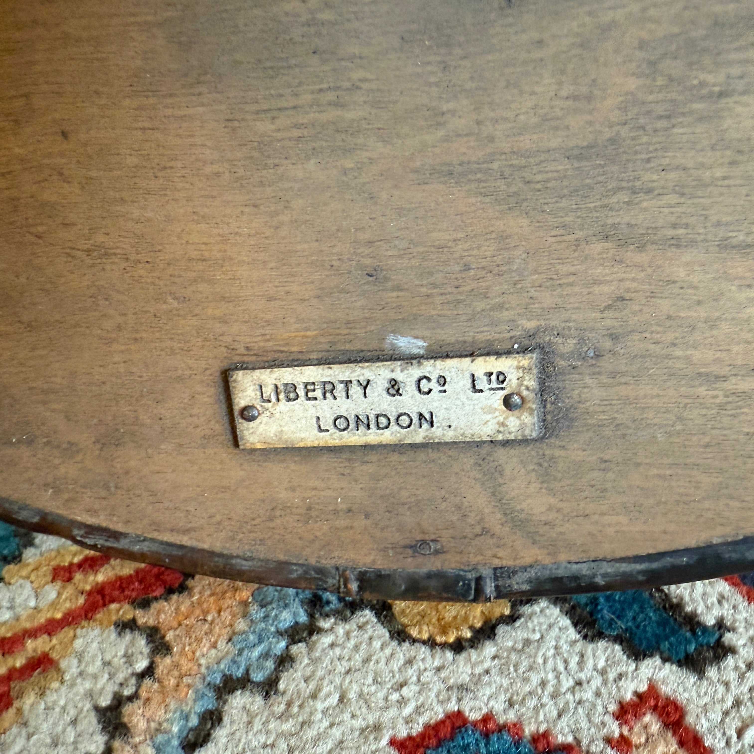 Liberty & Co copper mirror with a Liberty label to reverse circa 1900 