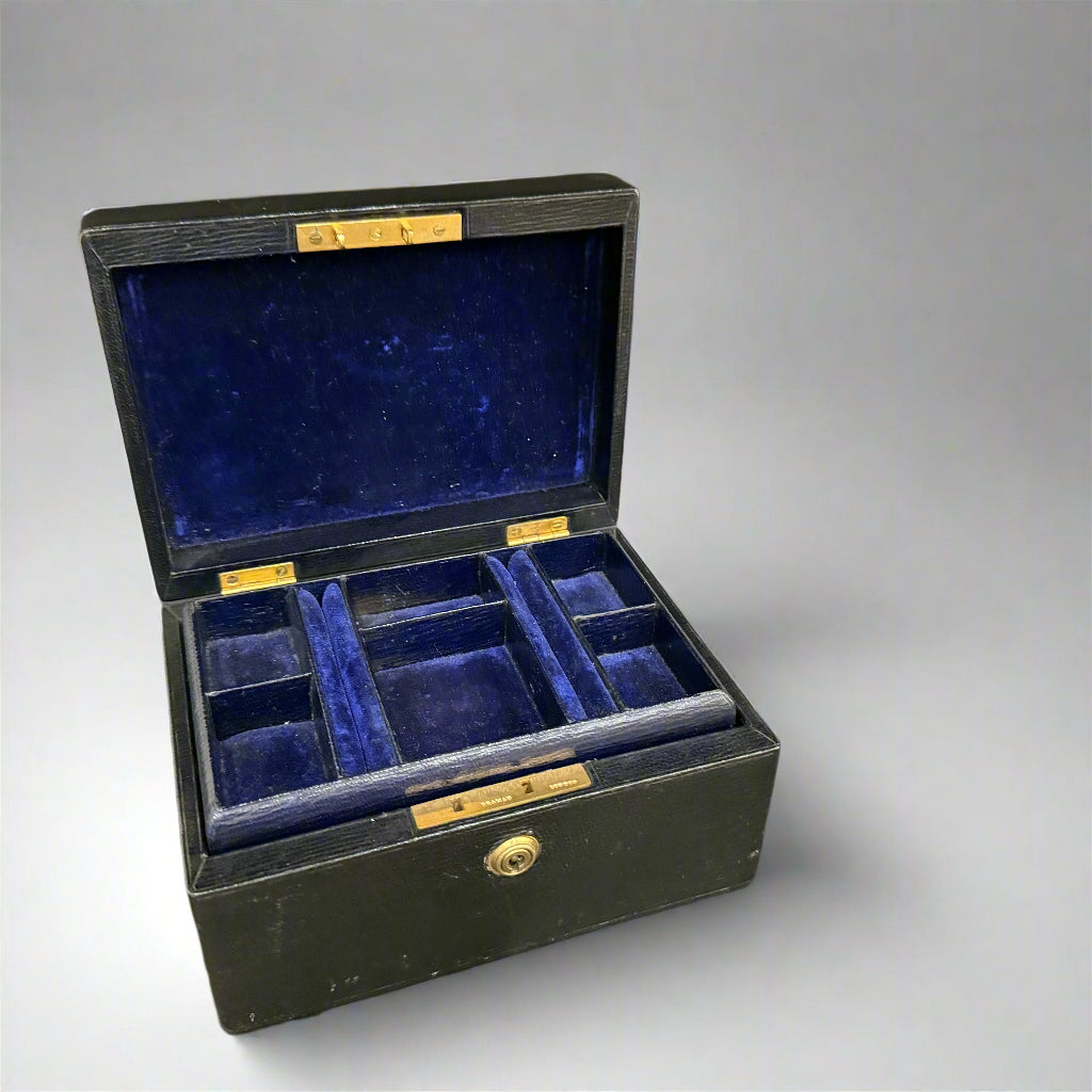 Early 20th century black leather jewellery box 