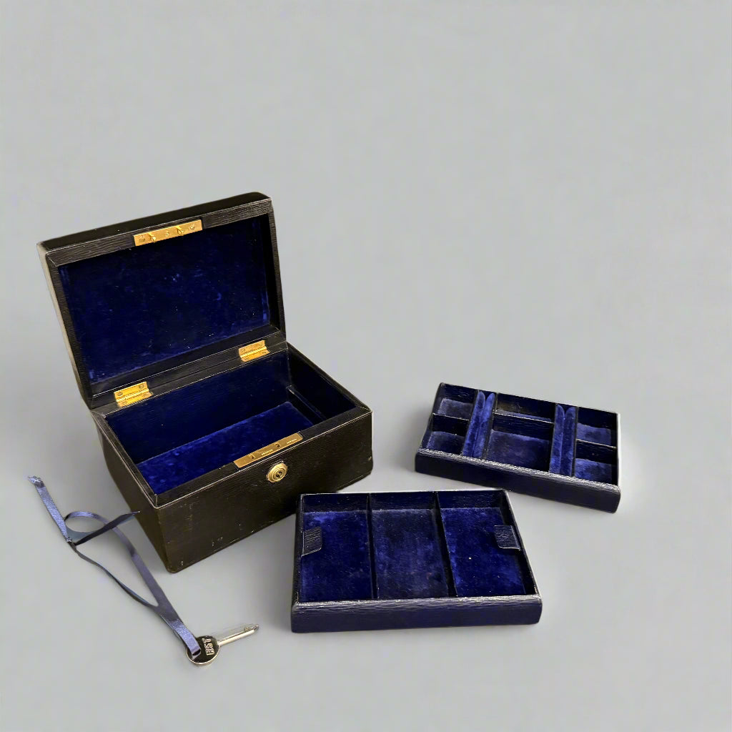 Early 20th century black leather jewellery box 