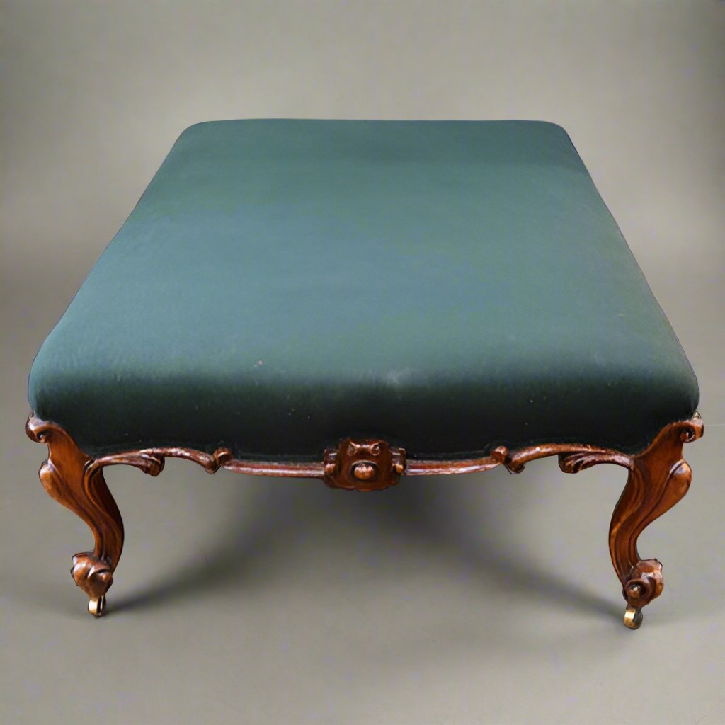 Green upholstered ottoman