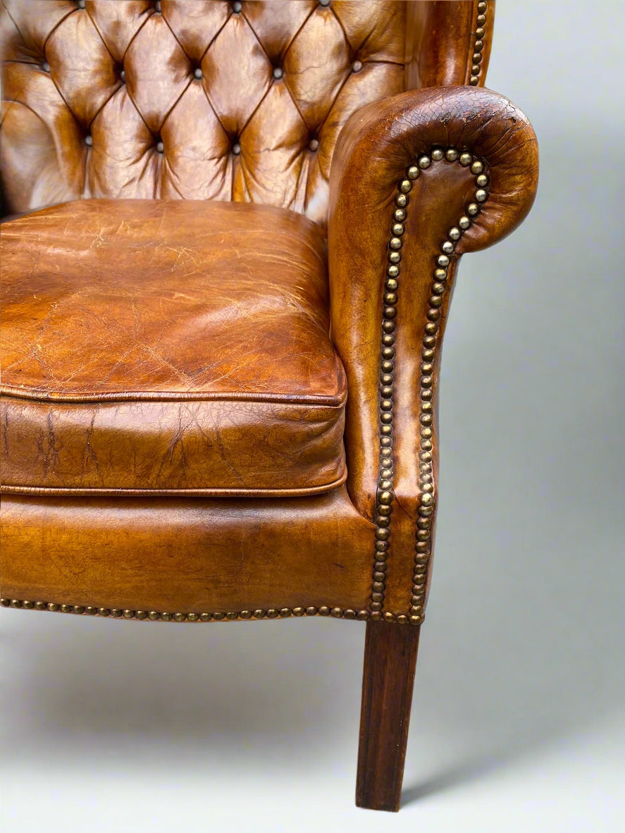 George VI leather button back wingchair circa 1940s