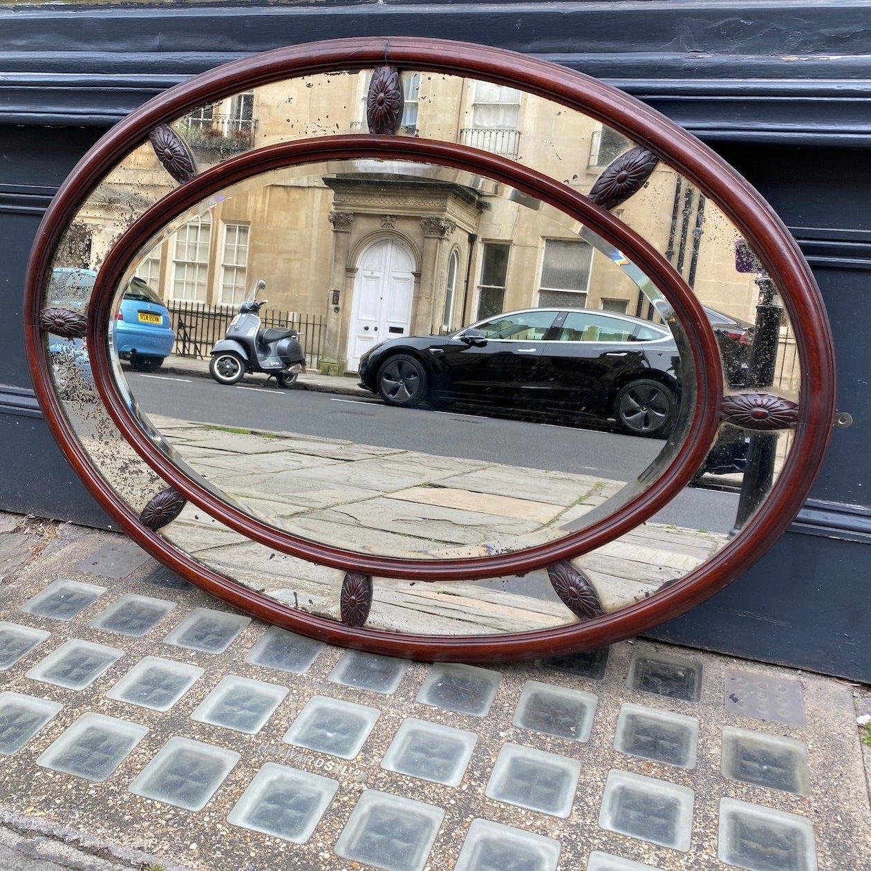 Oval mahogany mirror