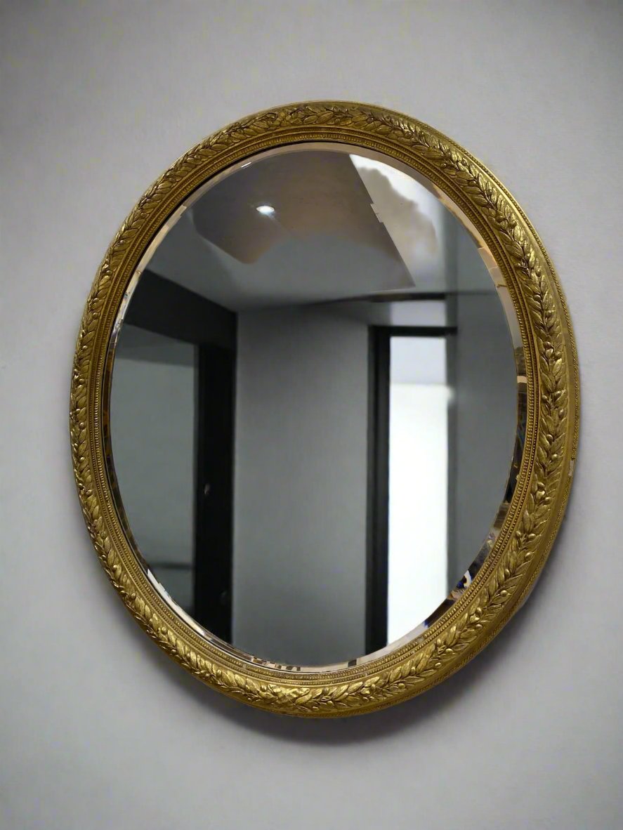 gilt oval mirror