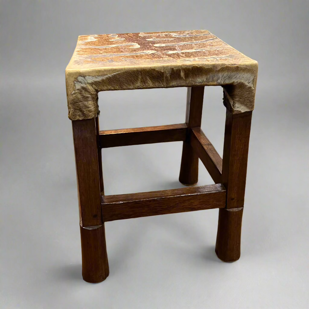 antique hide stool