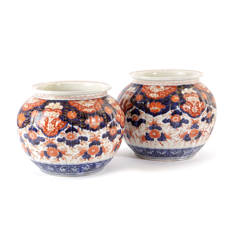 Late 19th century pair of Japanese Imari porcelain jardinieres 