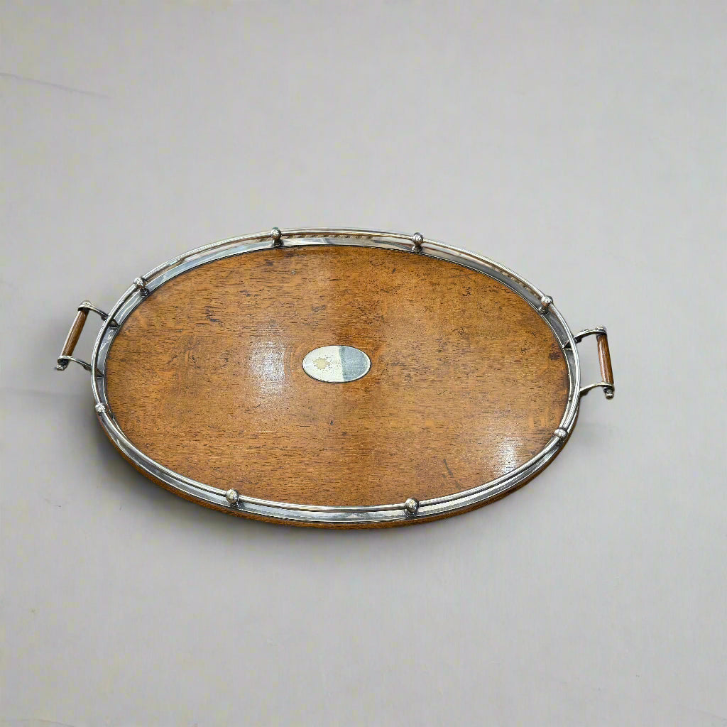 Large oak tray with silver plated gallery