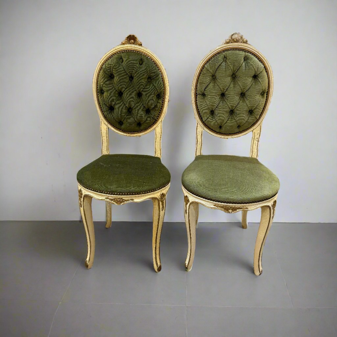 Pair of Louis XV style boudoir painted chairs upholstered in green 