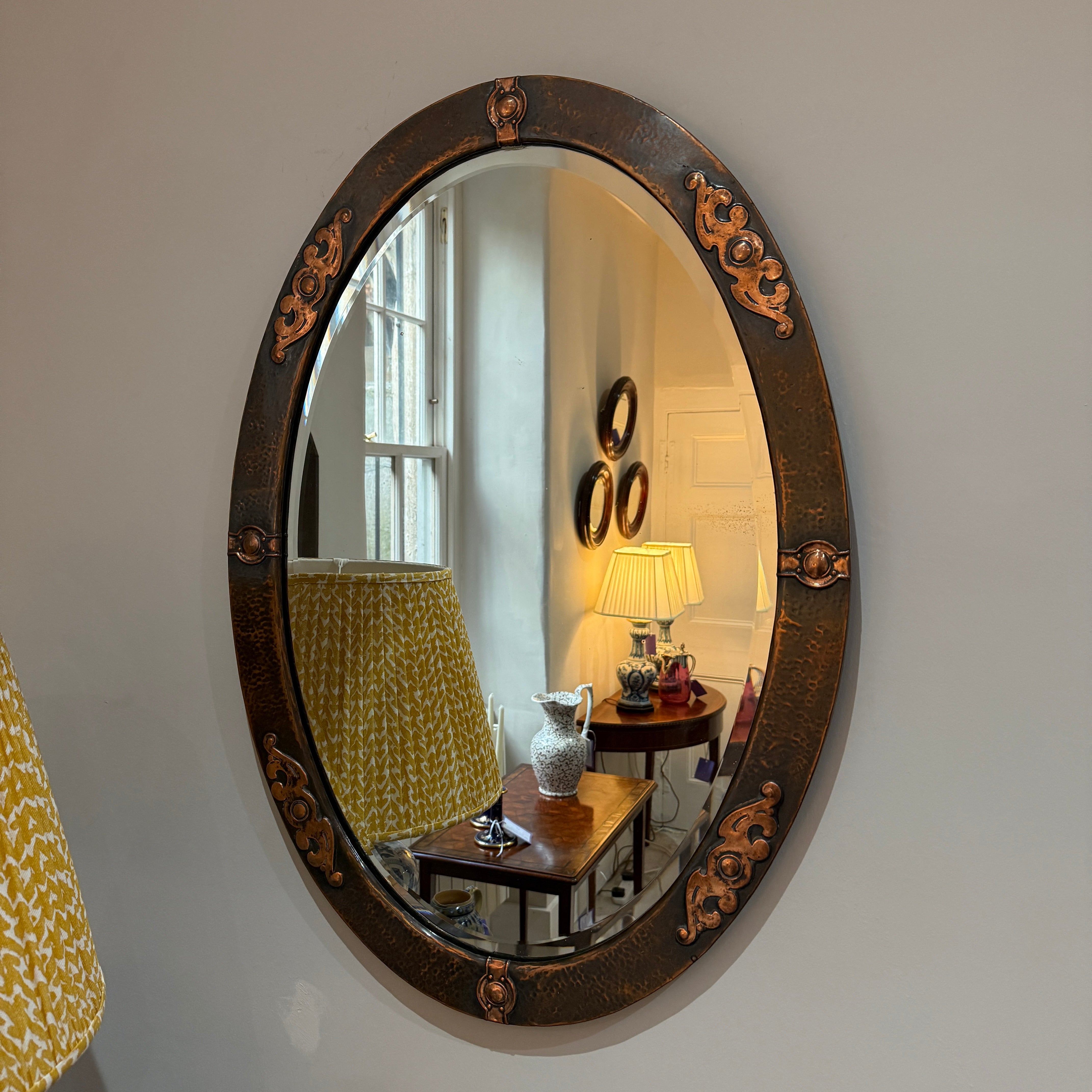 Liberty & Co copper mirror with a Liberty label to reverse circa 1900 