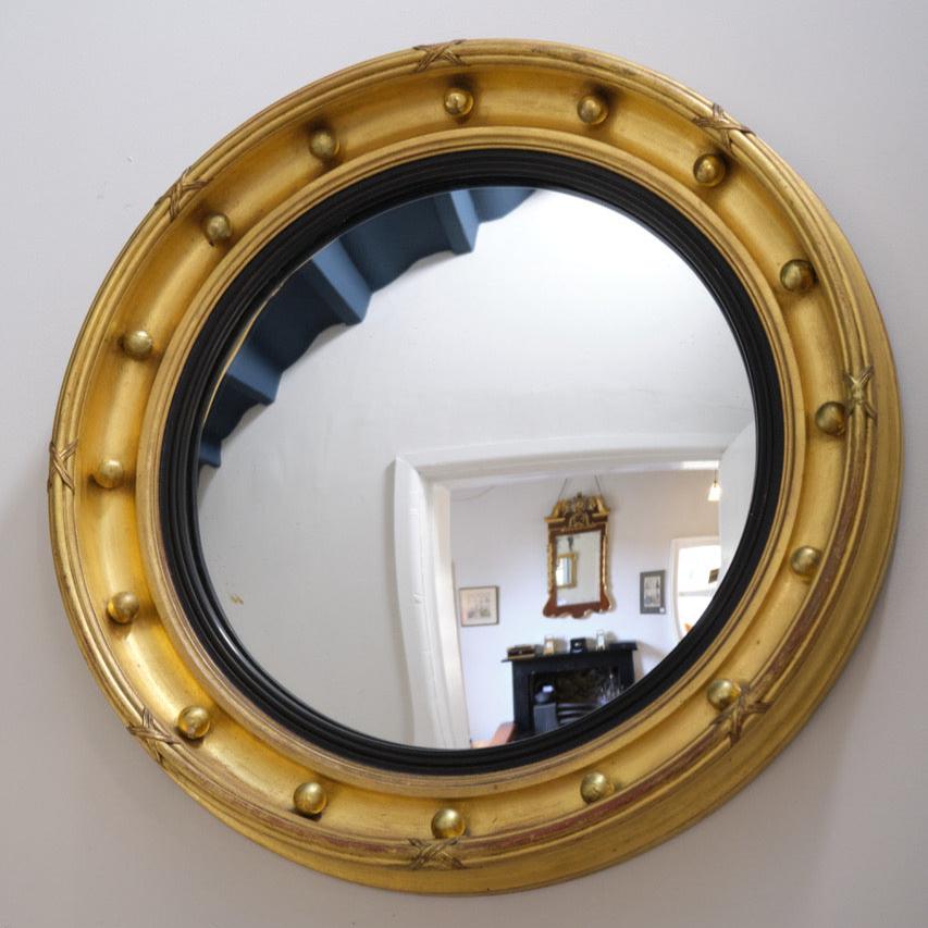 gilt convex mirror