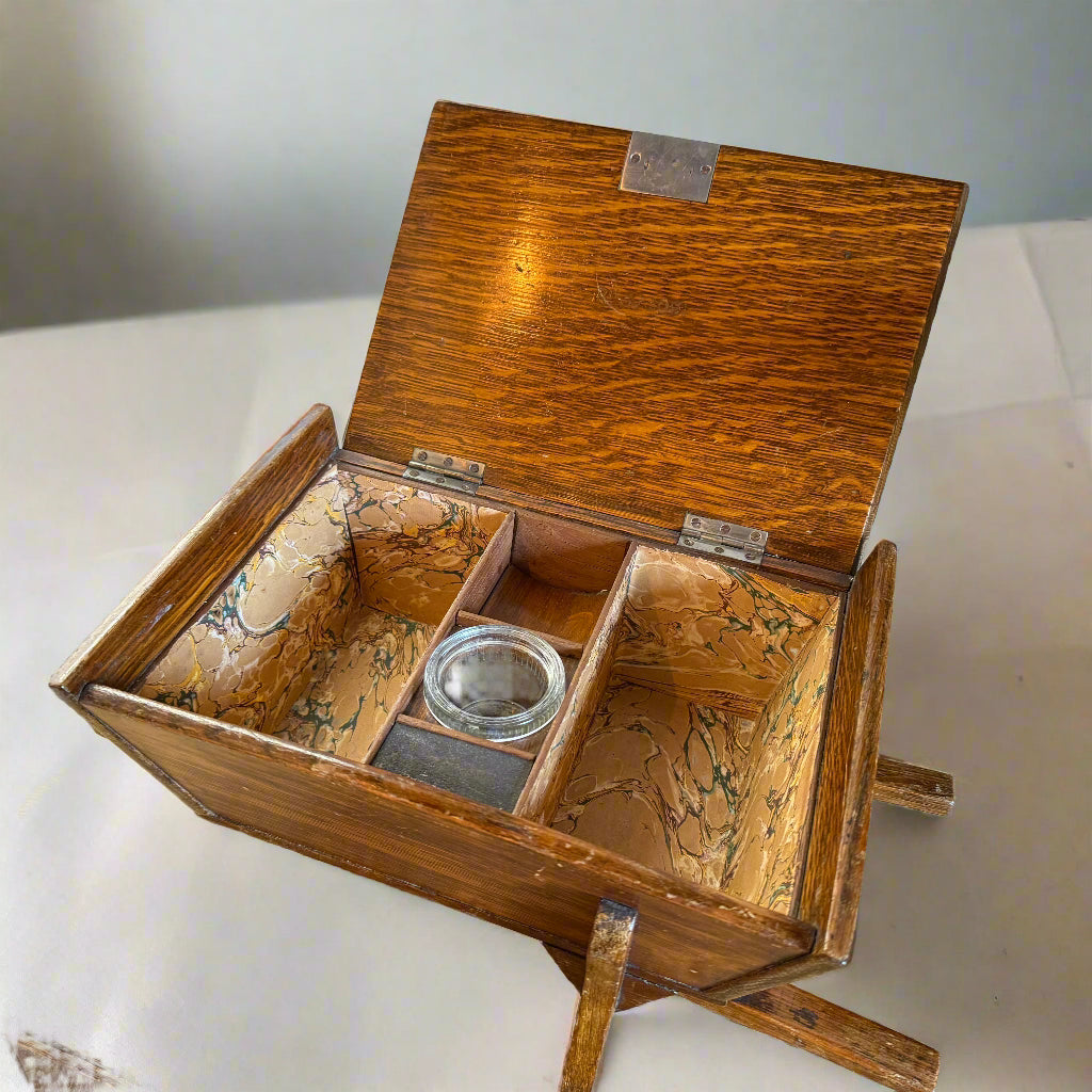 19th century oak brass-bound humidor in the shape of a wheelbarrow 