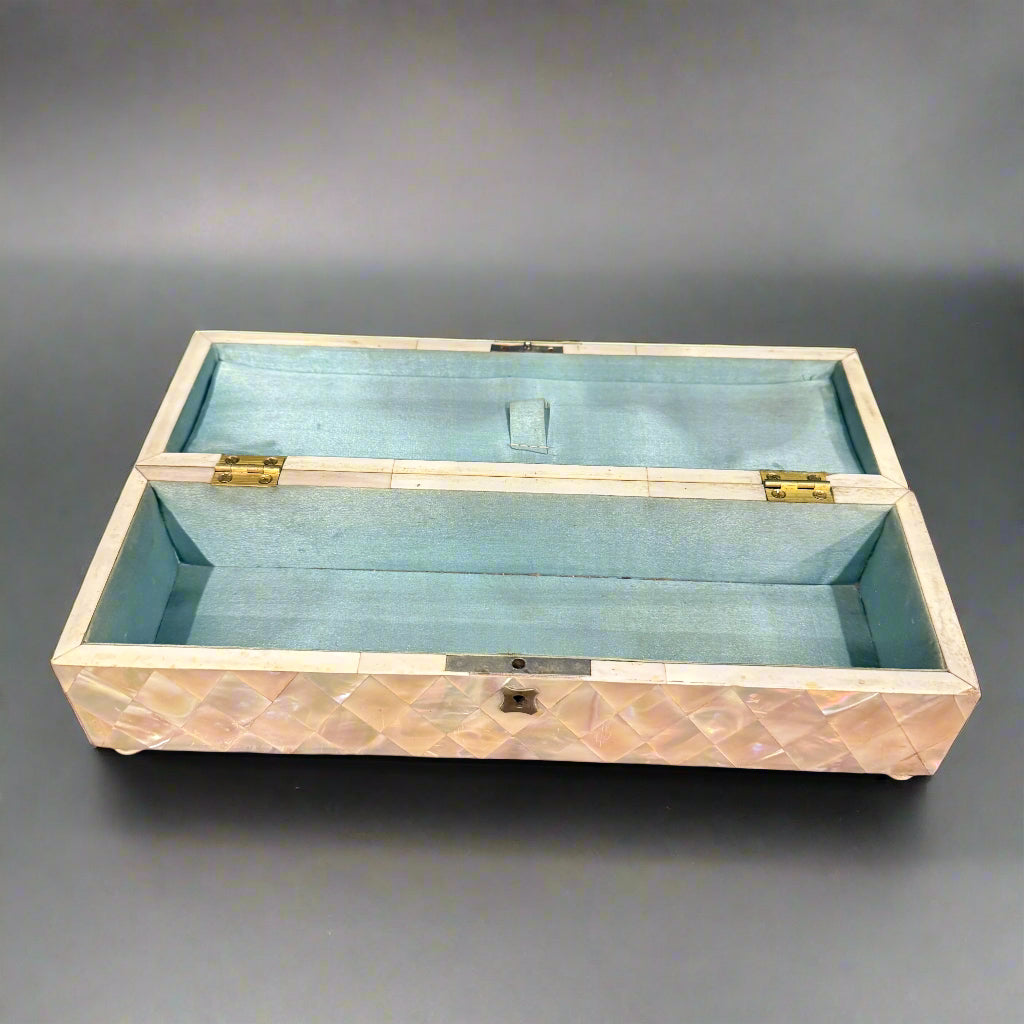Mother of pearl velvet lined box with silver top embossed with Reynolds angels made in Chester 1903