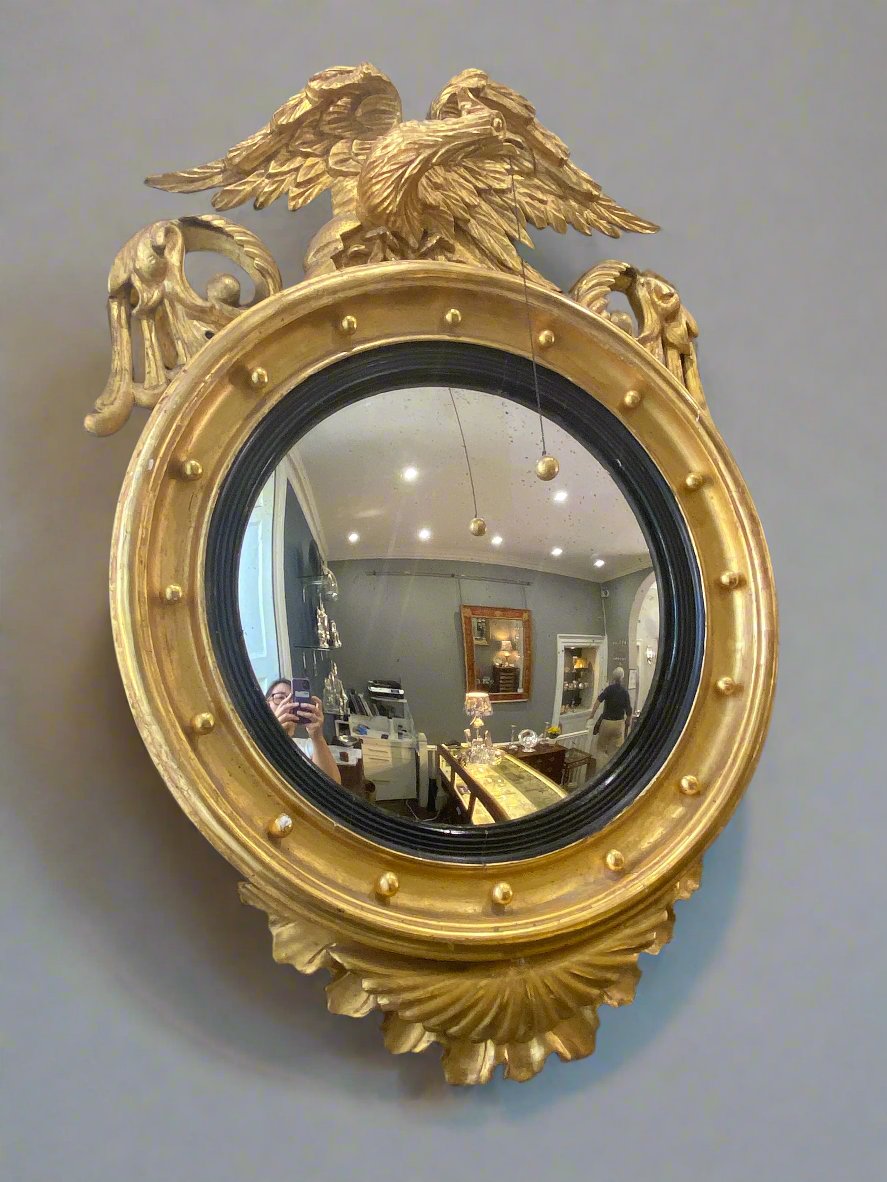 regency giltwood convex eagle mirror